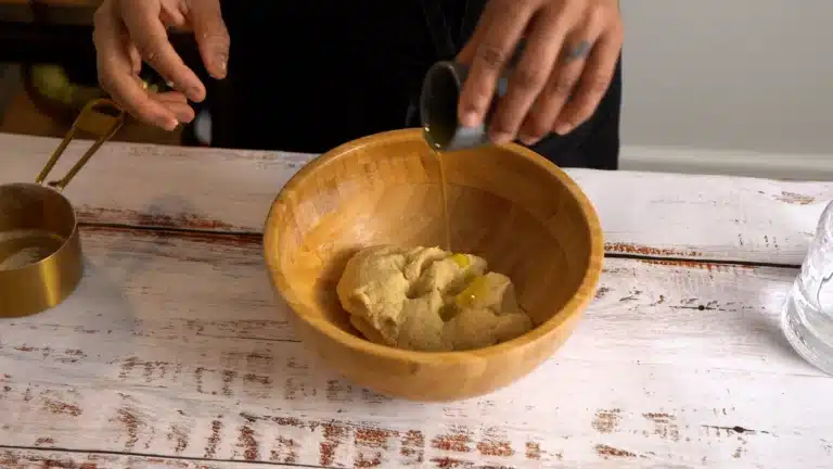 Add olive oil to make soft dough for roti