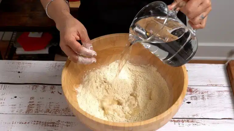 ad water to flour to knead it - turkish gozleme