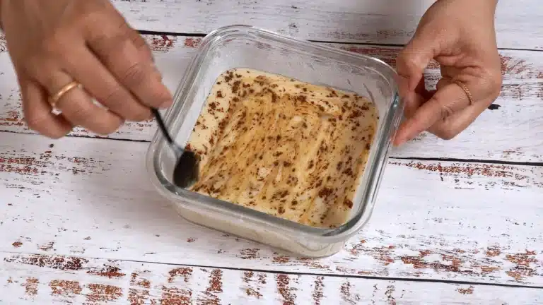 Banana Coffee Bread - pour banana in bowl and sprinkle coffee powder