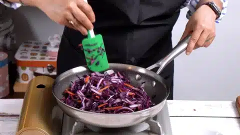 cook cabbage, carrot and sliced onion with chopped garlic