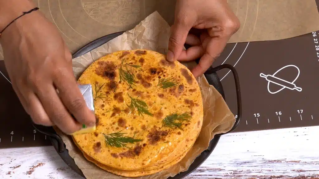 Tomato Roti - Colorful, Flavorful and Healthy apply butter and serve hot