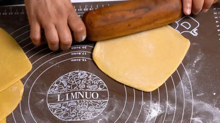roll again to make a square shape roti