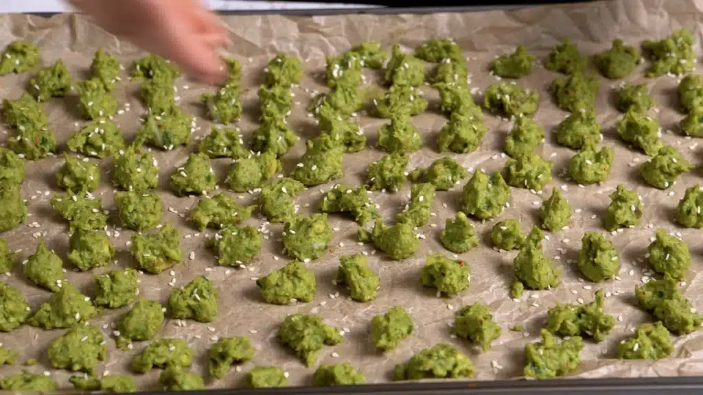 Baked Green Chickpeas : The Popcorn Upgrade sprinkle sesame seeds on top of chickpea