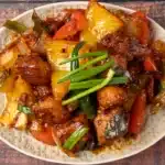 Spicy Devilled Potatoes ( Sri Lankan Inspired ) Devilled Chicken on a plate