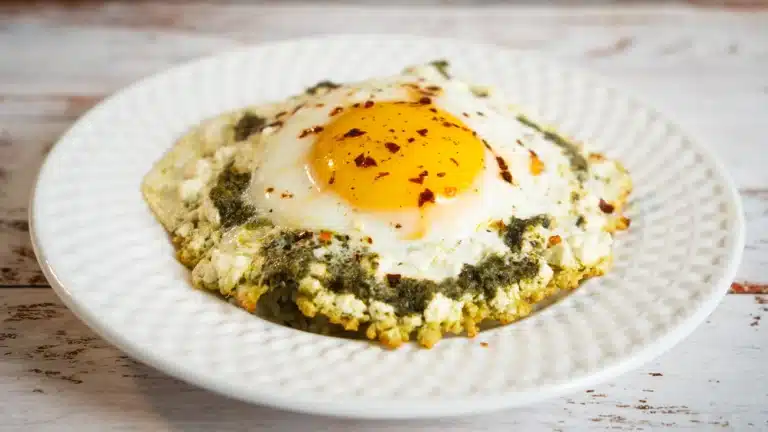 22 Best Omelette Recipes: Stop Eating Sad Eggs Today pesto feta omelette on a plate