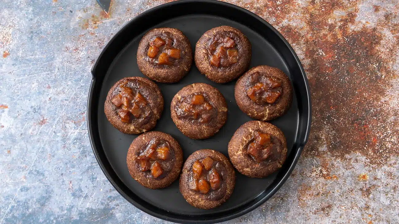 pumpkin pie cookies on a black round plate