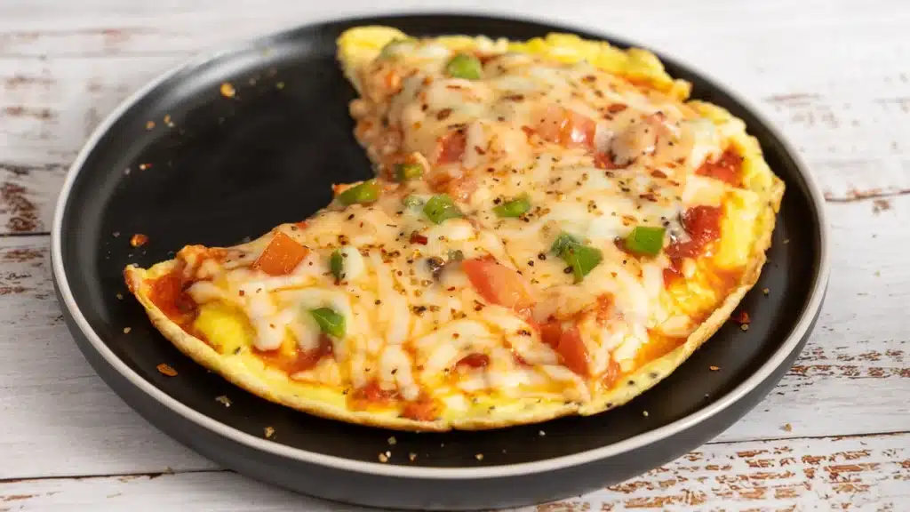 10-Minute Pizza Omelette – The Perfect Cheesy Breakfast pizza omelette on a plate