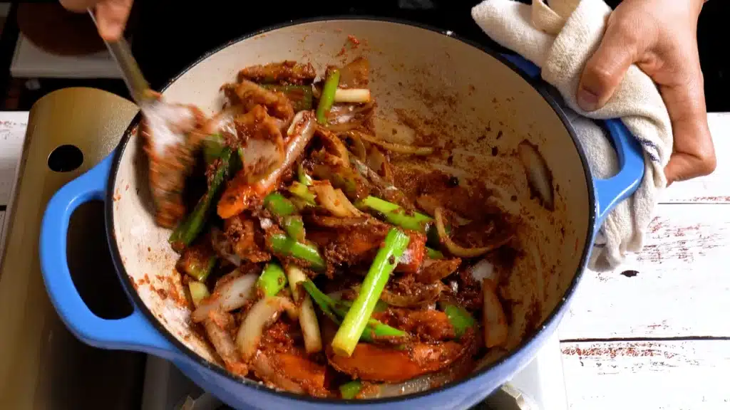 add all veggies, tomato sauce, soy sauce and millet flour
