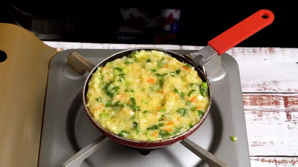 High-Energy Beaten Rice Omelette - Keeps You Full for Hours cook egg mixture on a pan