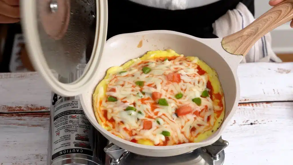 10-Minute Pizza Omelette – The Perfect Cheesy Breakfast cover on low heat until cheese melt