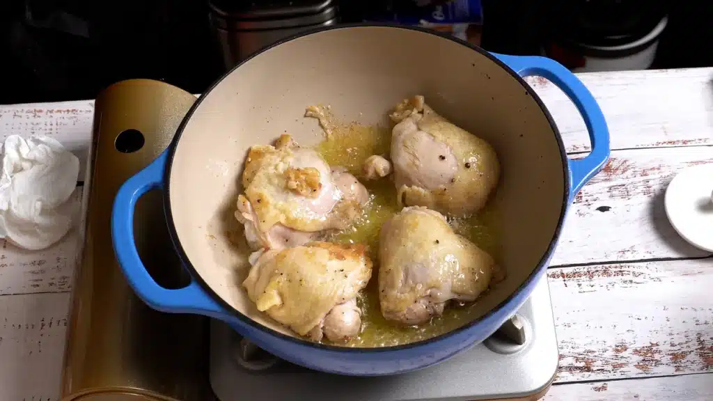 fry chicken in a pan