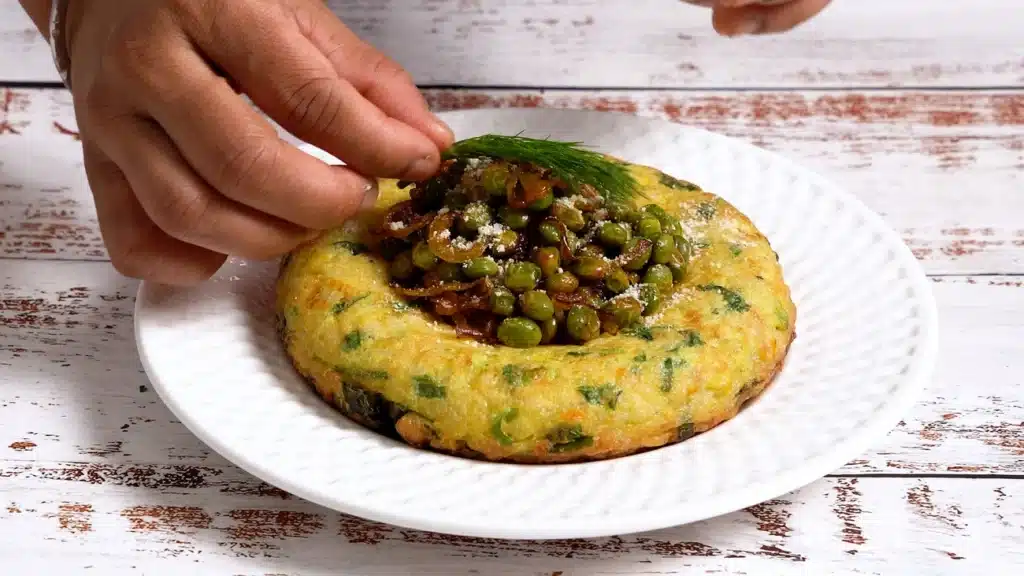 High-Energy Beaten Rice Omelette - Keeps You Full for Hours garnish with caramelized onion, fried pigeon peas and parmesan cheese
