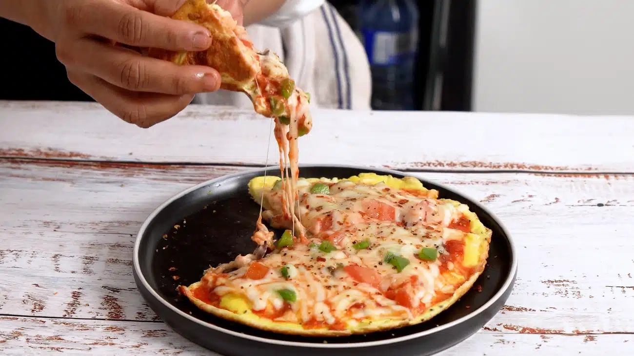 pizza omelette dropping melting cheese