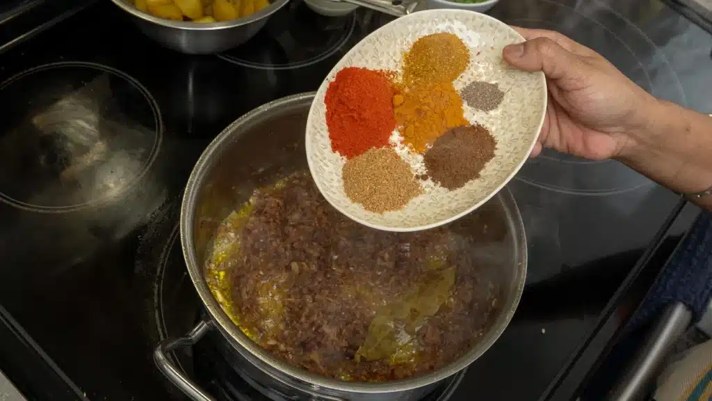 add all dry spices to the pan