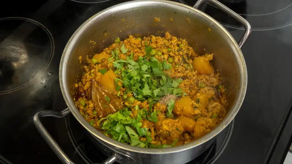 add coriander, mix gently and cover and switch off flame