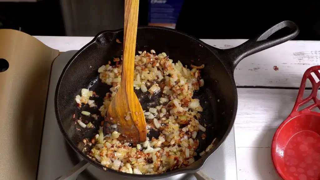 add minced chicken when onion turn soft and golden