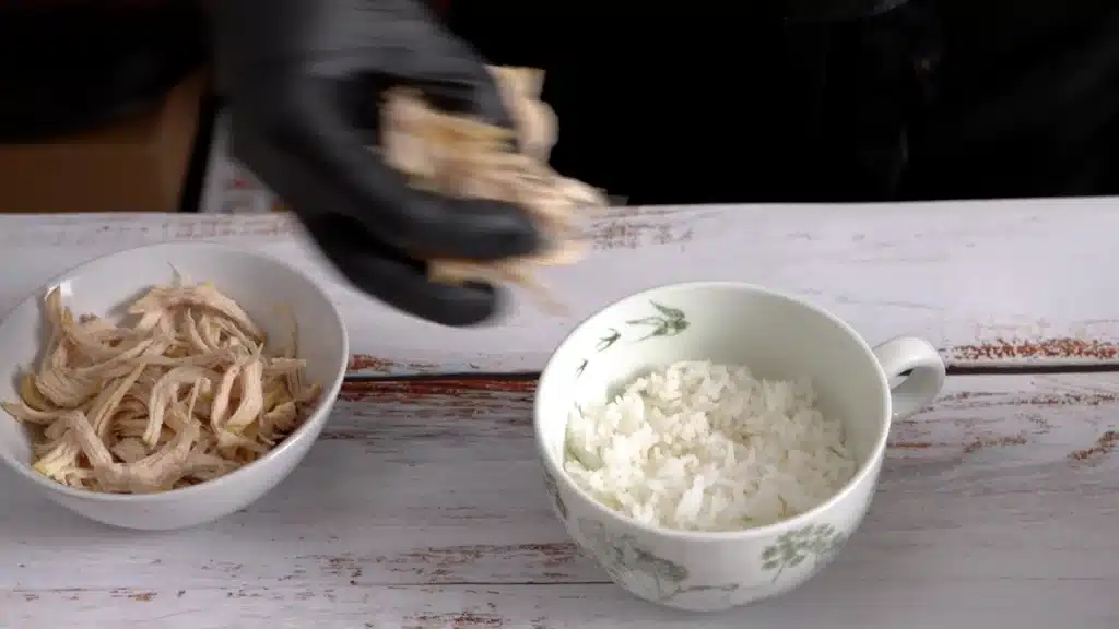 serve shredded chicken on top of rice than fill with soup