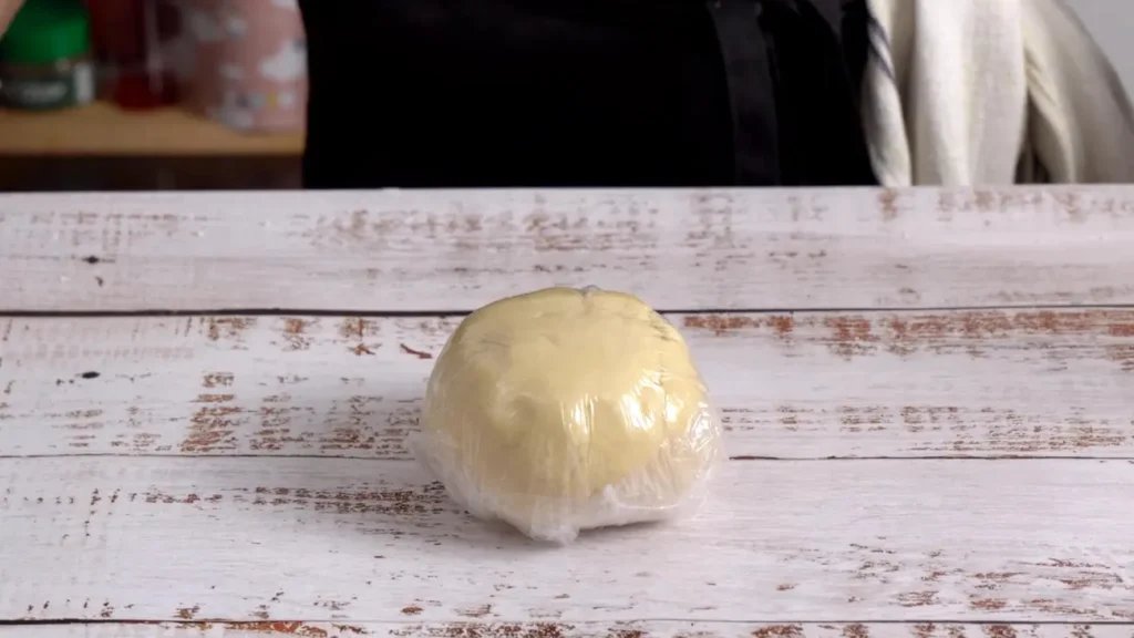 wrap dough in plastic wrap