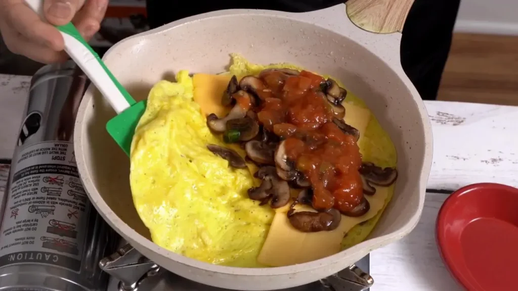 Mexican American Omelette : Spicy & Cheesy Breakfast add salsa & fold omelette