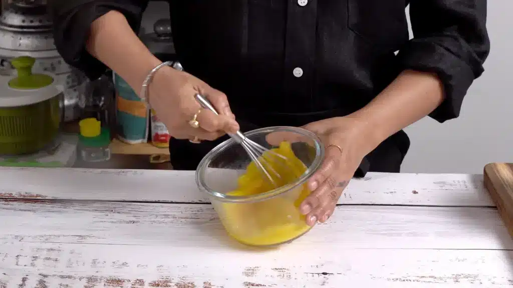 Mexican American Omelette : Spicy & Cheesy Breakfast beat eggs in a bowl