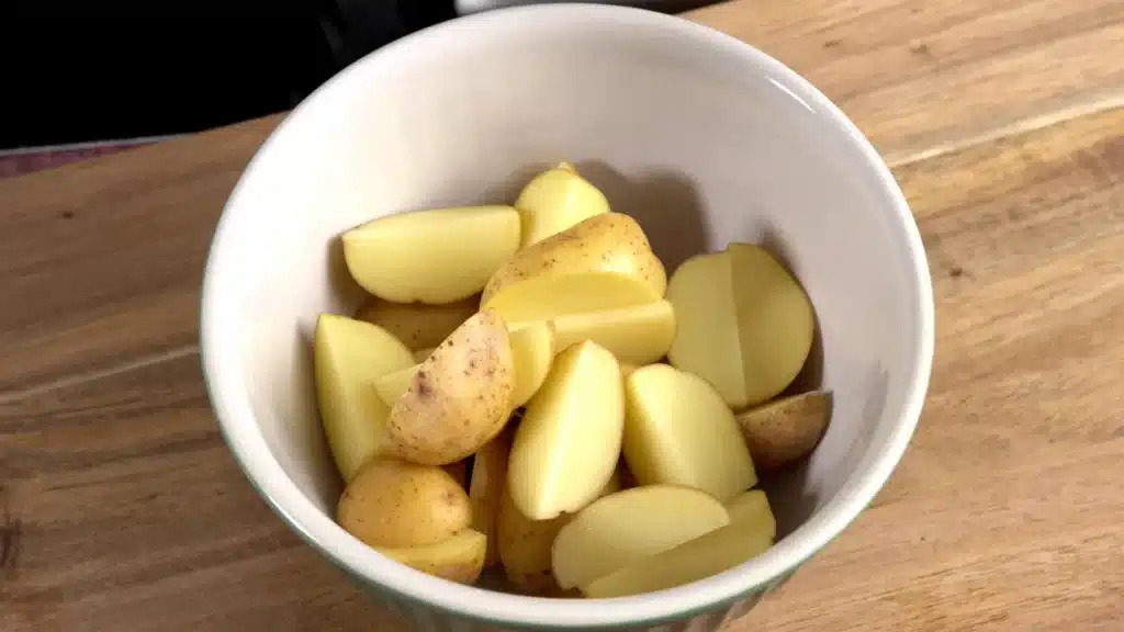 Spicy Devilled Potatoes ( Sri Lankan Inspired ) cut potatoes into wadges