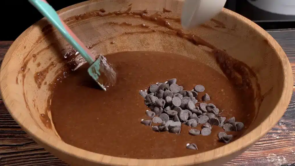 This Lentil Muffin Fooled Everyone - In the Best Way add all dry ingredients and Choco chips