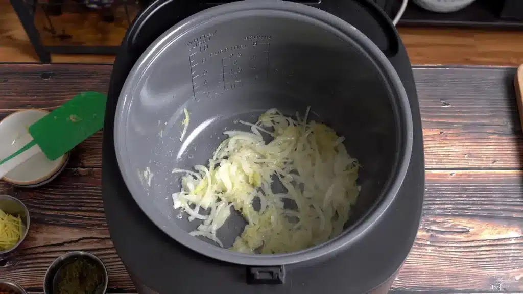 Melt-in-Your-Mouth Slow Cooker Pesto Chicken 🤤 (Easy Recipe!) sauté garlic and onion for 2 mins
