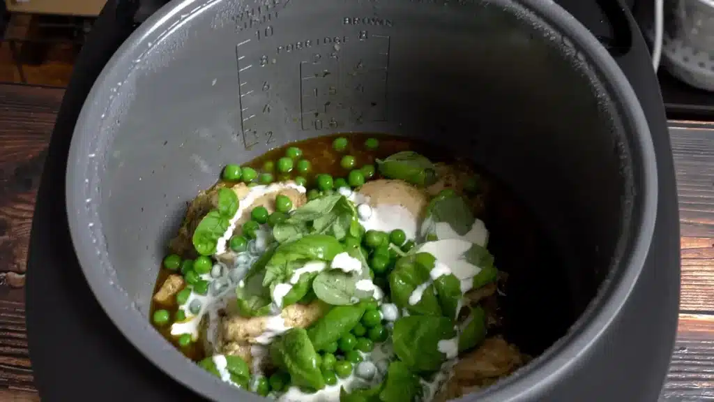 Melt-in-Your-Mouth Slow Cooker Pesto Chicken 🤤 (Easy Recipe!) slow cook then add peas, basil and cooking cream