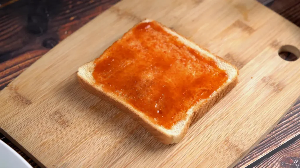 Crispy Bread Pizza (Ready in 10 Minutes!) take bread slice and add Sause