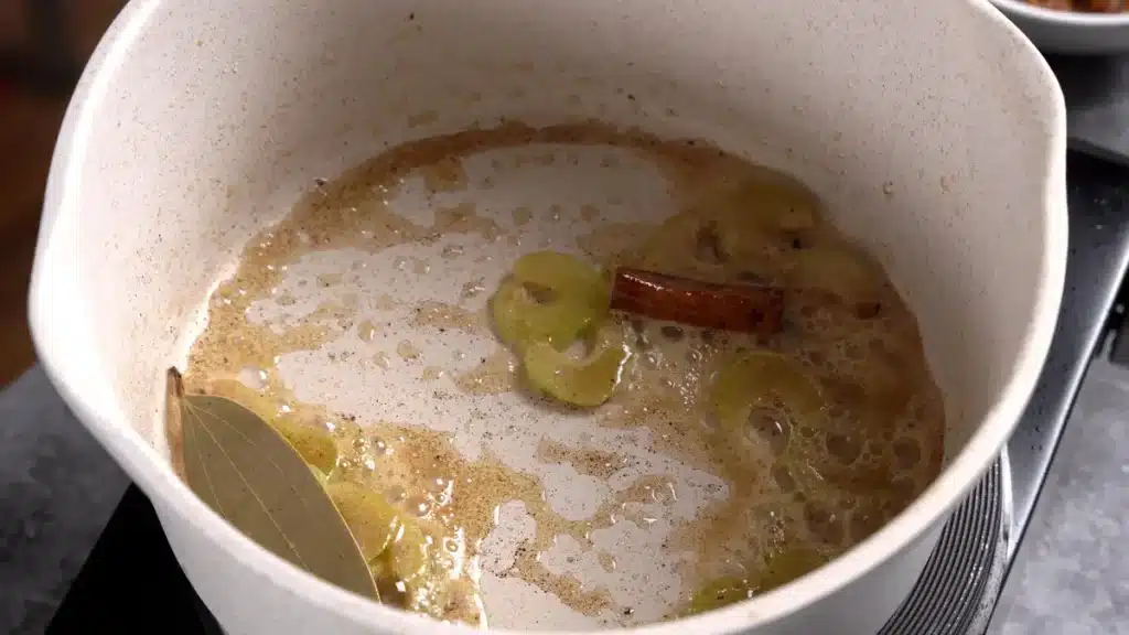 Egg Curry in 45 Mins: Quick & Spicy Comfort Food add butter, bay leaf ,celery, cinnamon stick
