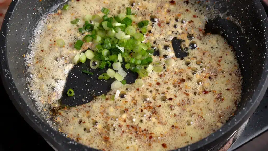 Butter Garlic Rice : Quick & Easy Using Leftover Rice add chilli flakes and green onion when garlic turn golden