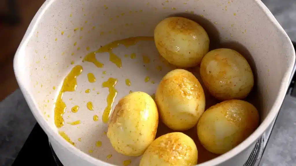 Egg Curry in 45 Mins: Quick & Spicy Comfort Food add eggs and roast until brown