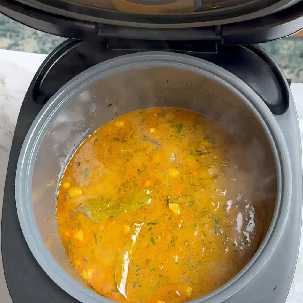 Slow Cooker Chickpea: Easy & Spiced Dinner Recipe add soaked chickpeas with water and ghee