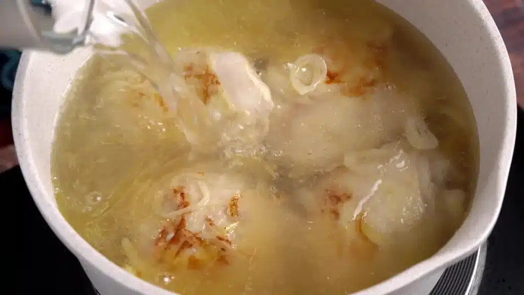 add water, chicken broth, salt and pepper