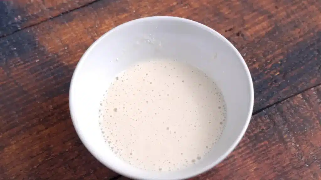 mix flour and water to make slurry and mix to pot