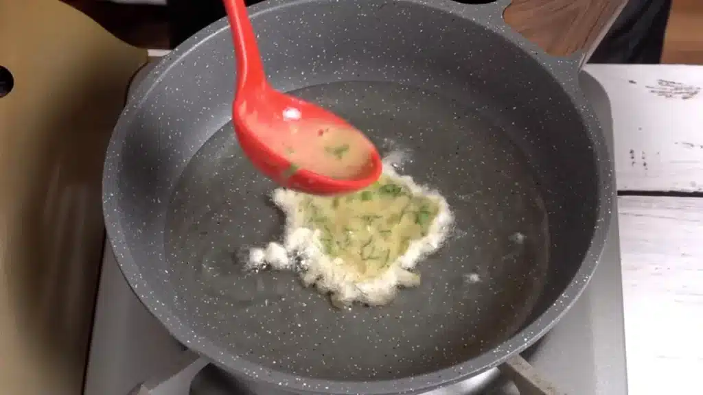 scoop the mixture and pour into hot oil