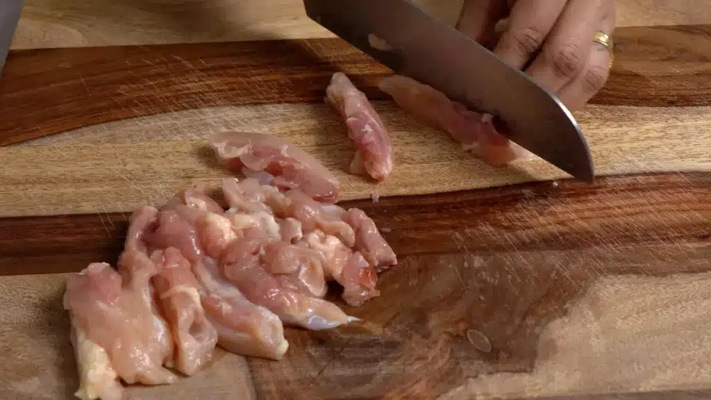 Chicken Thai Glass Noodles: Delicious & Quick 30-Min Recipe Slice chicken thighs