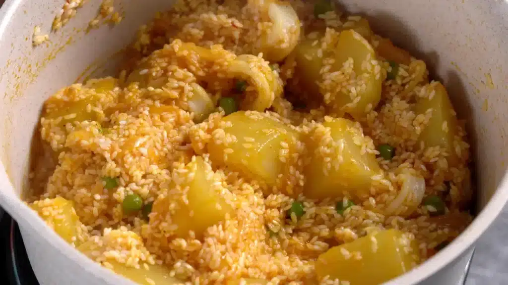 add calamari, soaked rice and saffron water