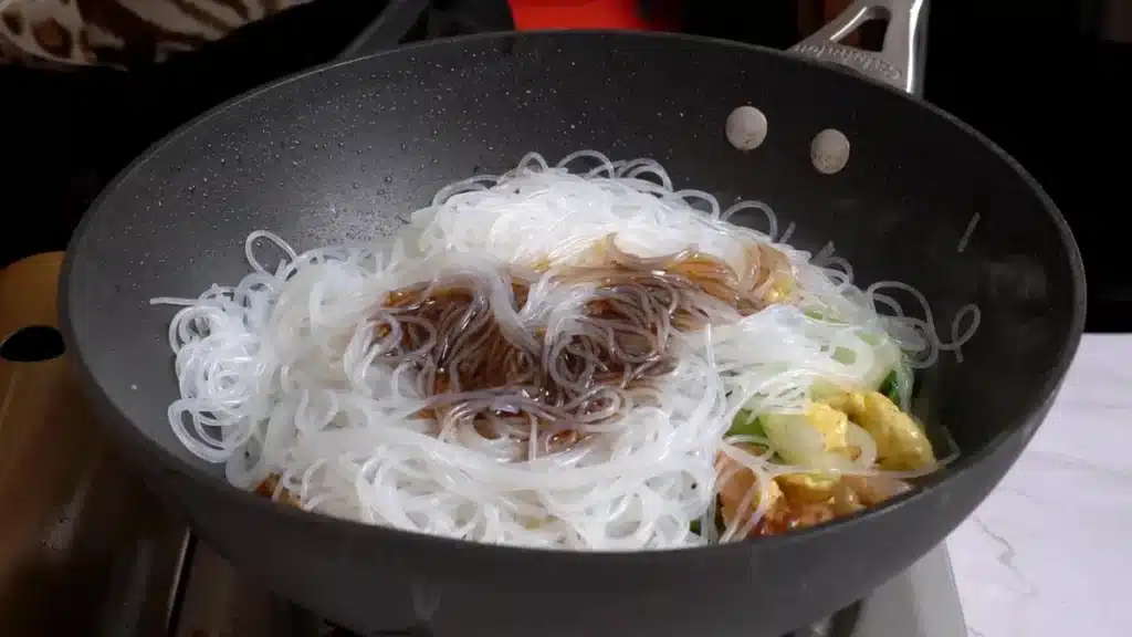 Chicken Thai Glass Noodles: Delicious & Quick 30-Min Recipe add noodles and sauce