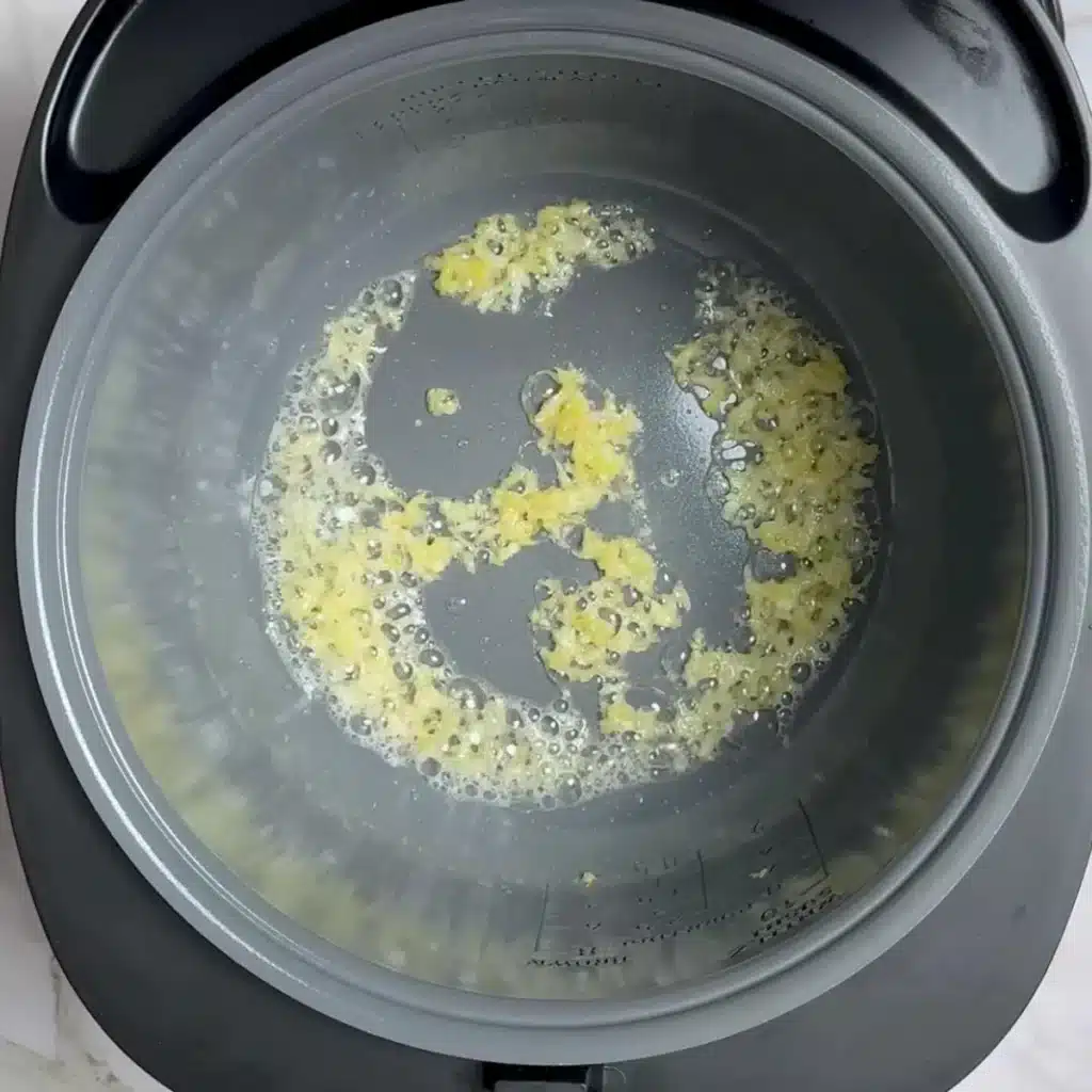 add oil with ginger & garlic