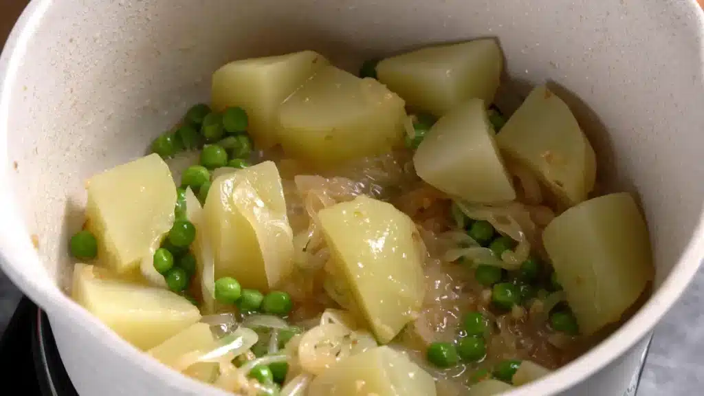 add peas, boiled potatoes