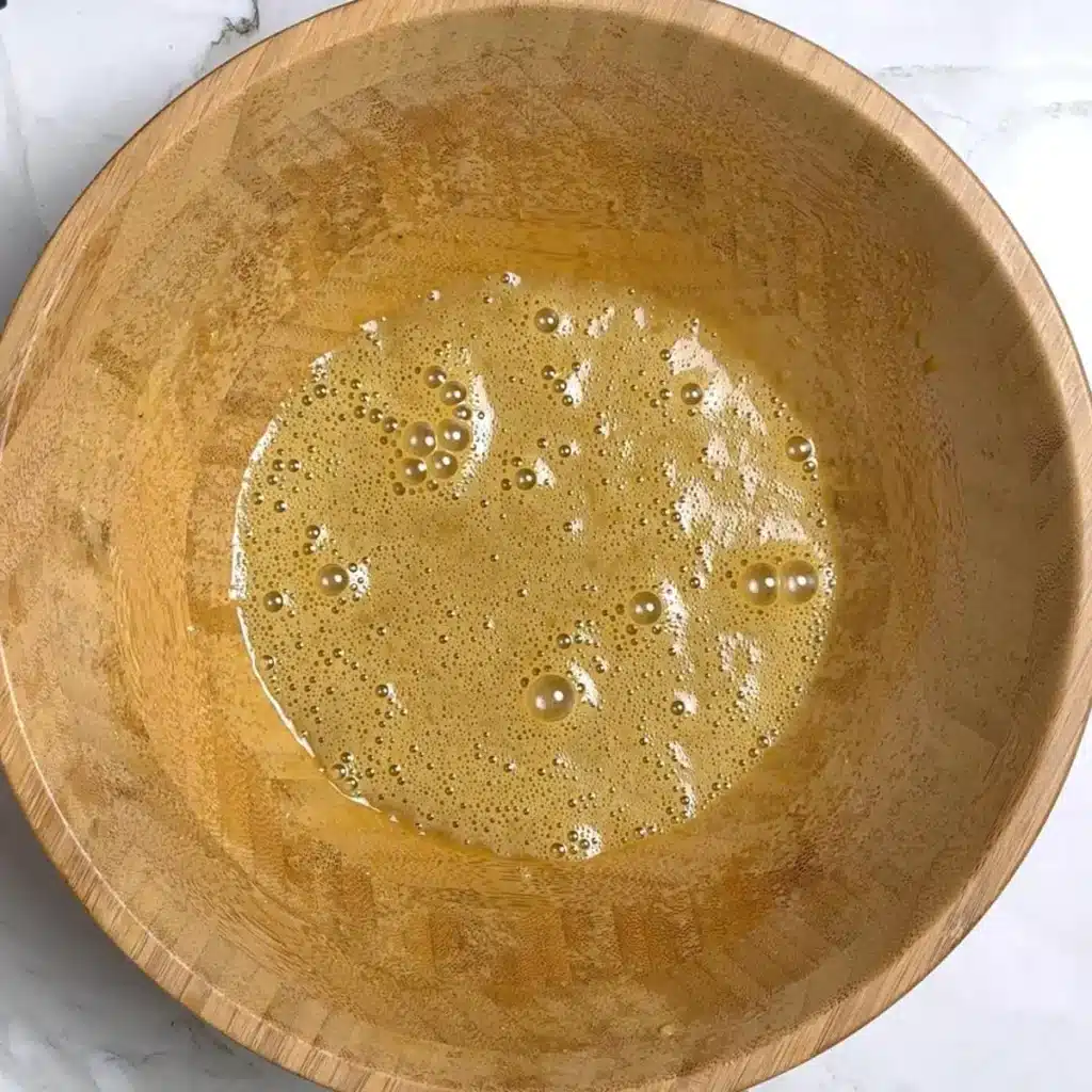 mix banana, eggs, and liquid ingredients