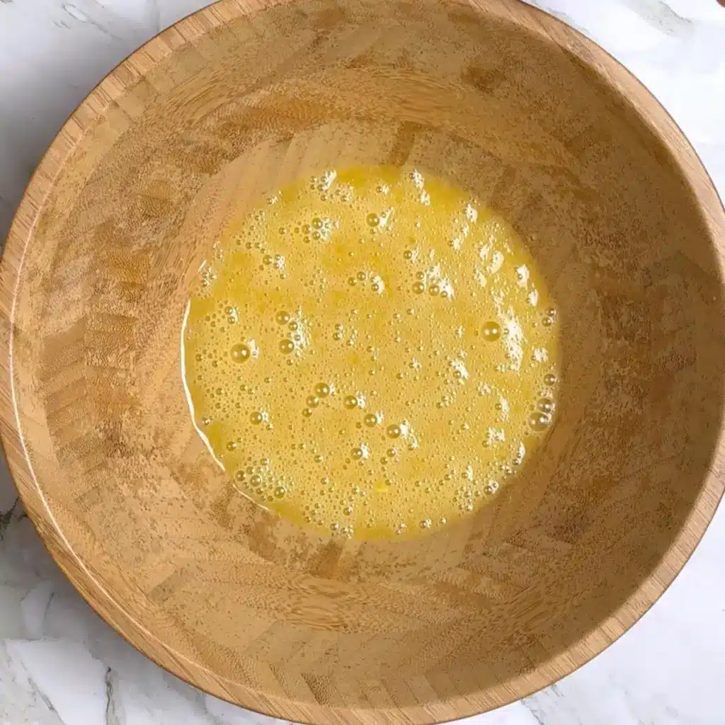 mix egg with maple syrup, olive oil and vanilla mix