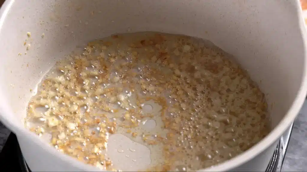 saute chopped garlic until golden