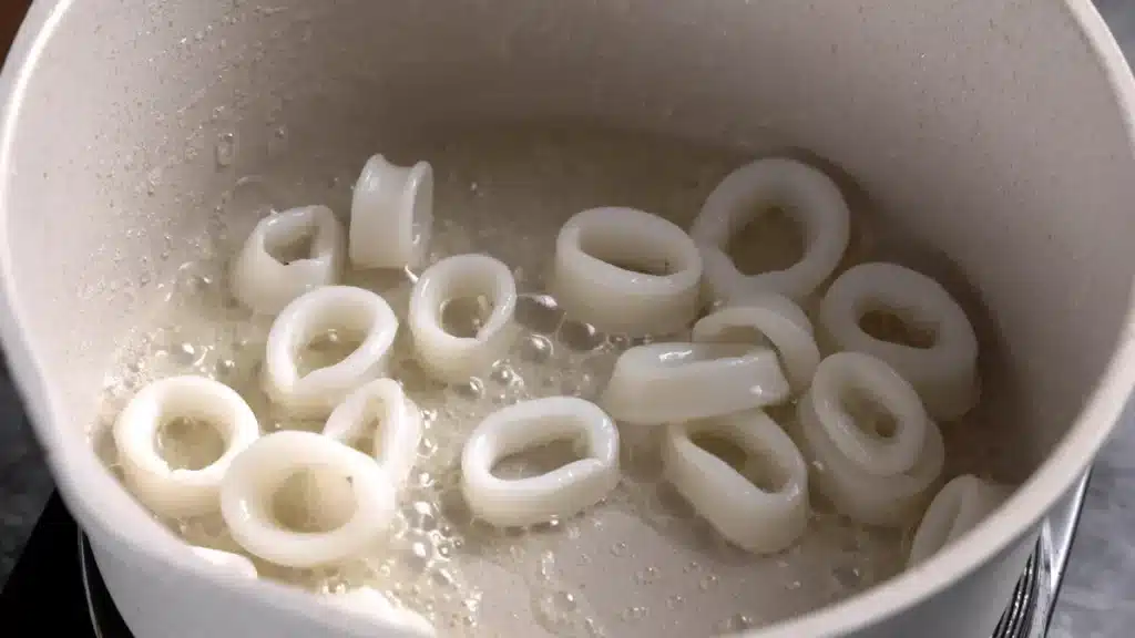 sauteing all the seafood one by one