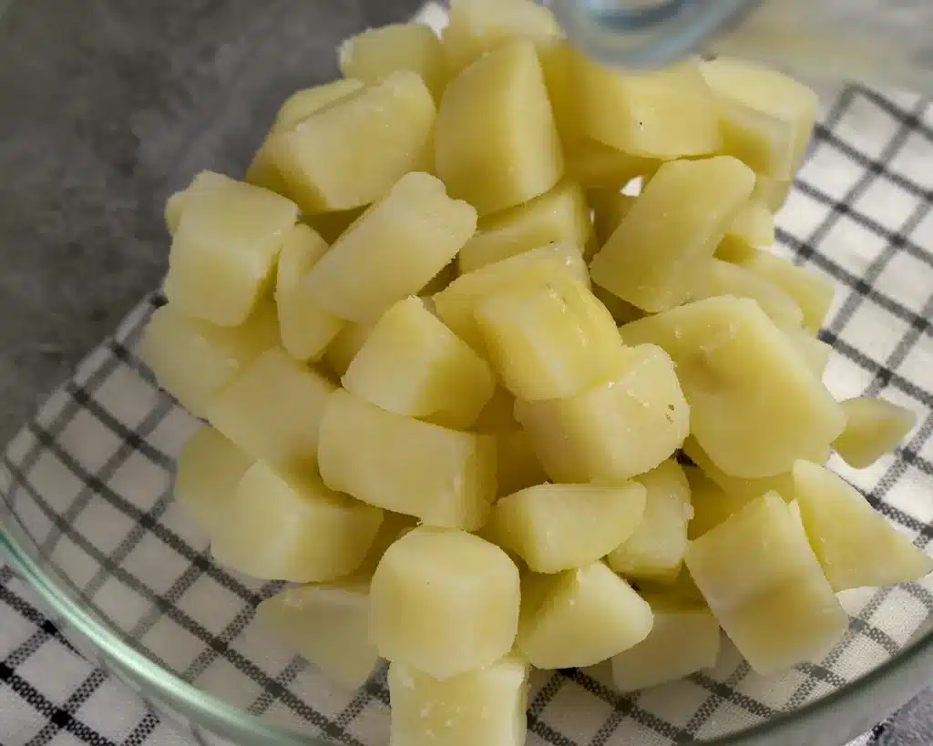 Vegetable Casserole: A Cheesy Dinner Recipe Chop your potatoes and boil them