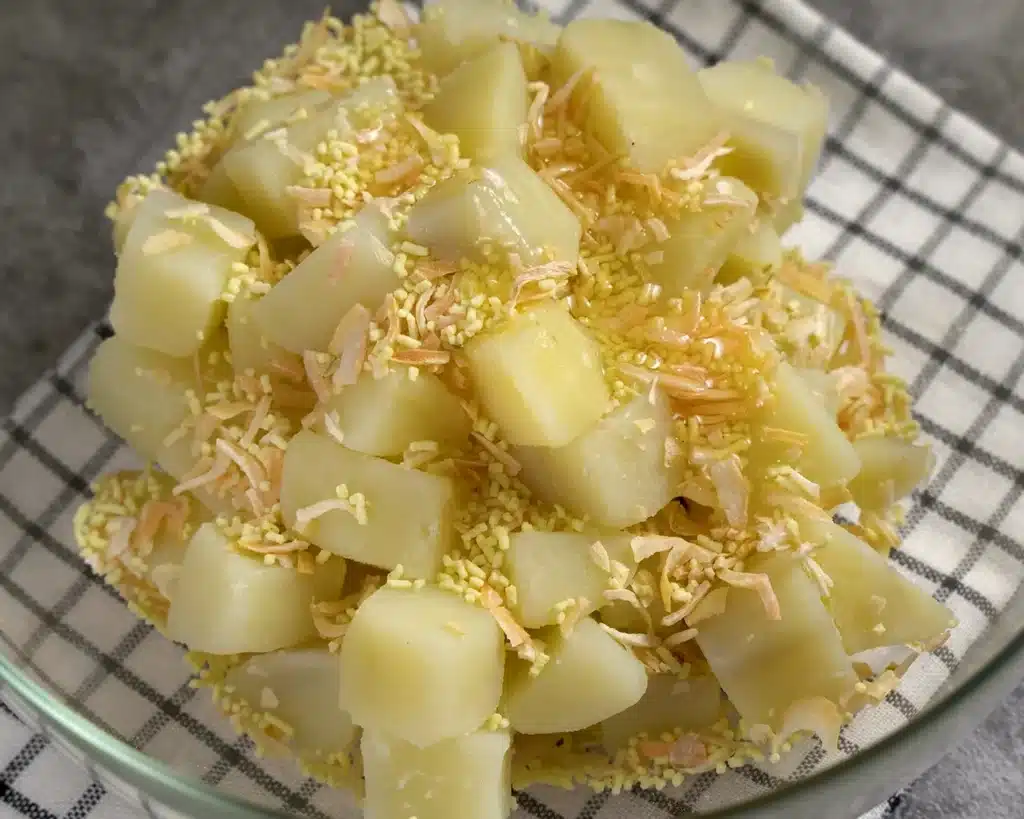 Vegetable Casserole: A Cheesy Dinner Recipe Toss the cubed potatoes into a bowl and mix them with dehydrated onions, dry soup mix, and olive oil and mix them.