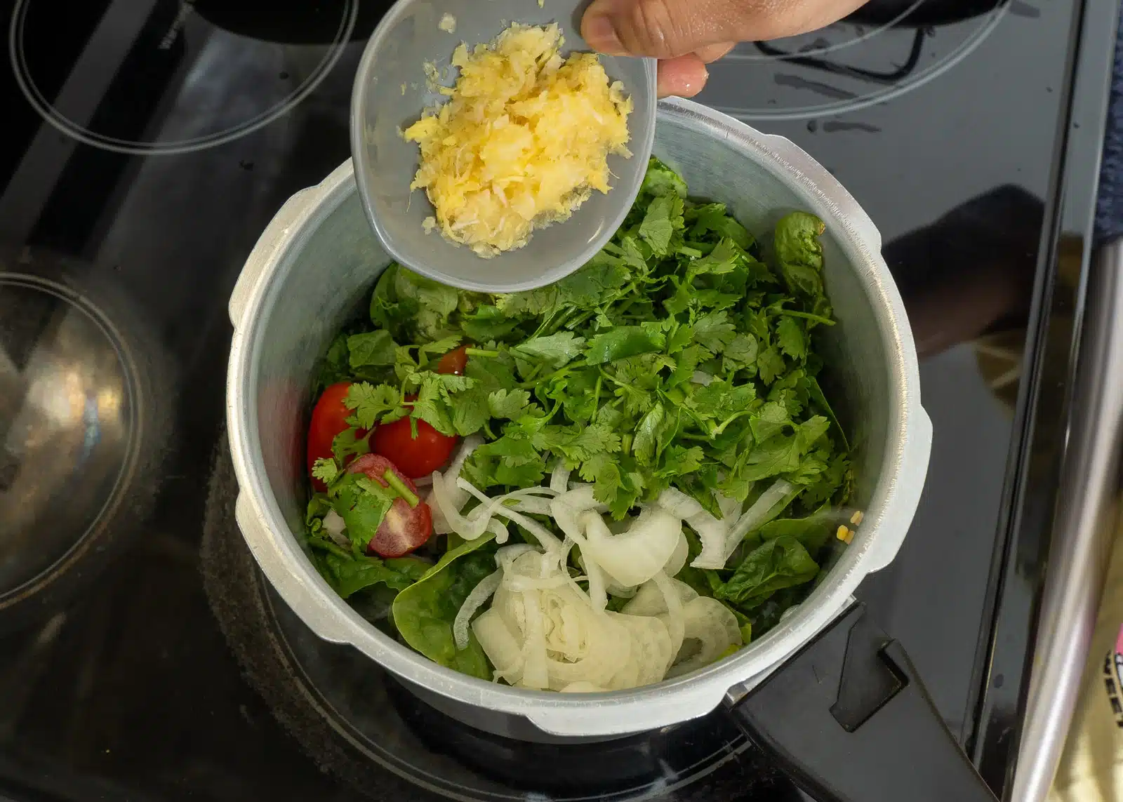 add onion, tomato, coriander leaves & crushed ginger garlic