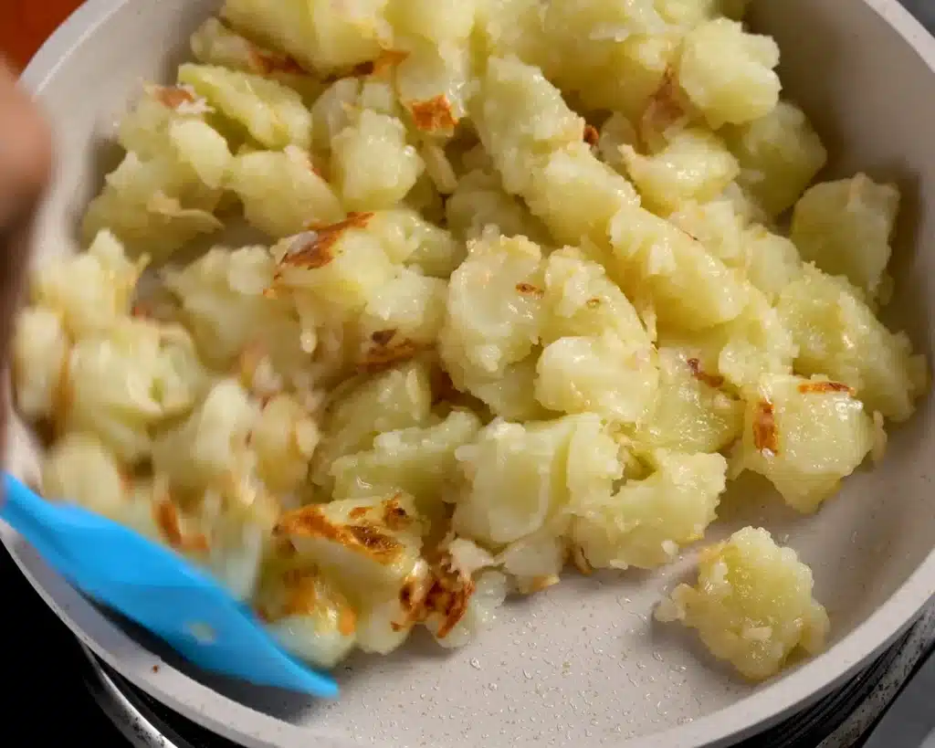Vegetable Casserole: A Cheesy Dinner Recipe Roast the potato mixture in a pan until they turn golden.