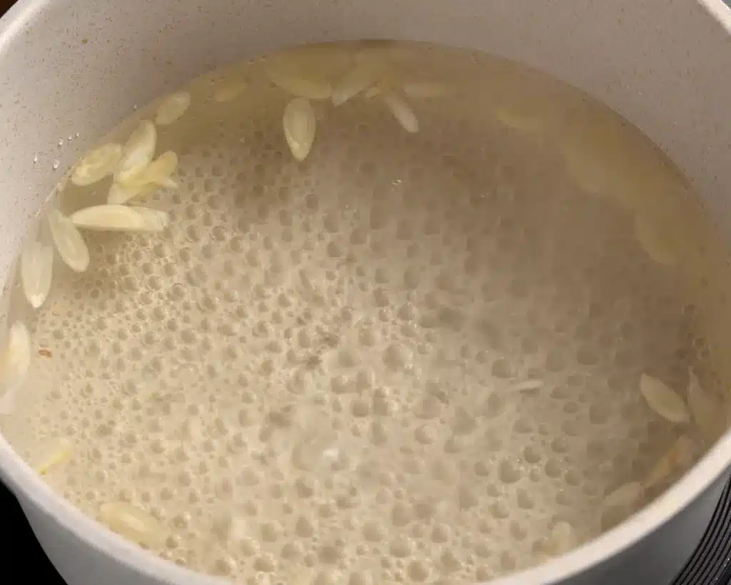 Mamounia: Quick 10-Minute Syrian Breakfast Recipe Add a cinnamon stick and a handful of soaked almonds to the sugar water and heat until it reaches a full boil.
